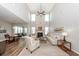 Spacious living room with high ceilings, fireplace, and abundant natural light at 123 Lakelyn Rd, Moncks Corner, SC 29461