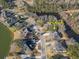 Aerial view of 1249 Waterfront Dr located along the water in a neighborhood surrounded by woods at 1249 Waterfront Dr, Mount Pleasant, SC 29464