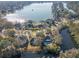 Aerial view of 1249 Waterfront Dr, nestled in a lakeside community with mature trees and lush landscaping at 1249 Waterfront Dr, Mount Pleasant, SC 29464