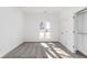 Bright bedroom with a large window, neutral carpet, and ample closet space at 1249 Waterfront Dr, Mount Pleasant, SC 29464