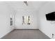Bright bedroom with a ceiling fan, recessed lights, and large windows for natural light at 1249 Waterfront Dr, Mount Pleasant, SC 29464