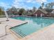 Bright and inviting outdoor swimming pool surrounded by lounge chairs and a well-maintained deck area at 1249 Waterfront Dr, Mount Pleasant, SC 29464