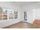 Sunroom boasts tile floors, windows all around, and an exterior door leading to an outdoor deck at 1249 Waterfront Dr, Mount Pleasant, SC 29464