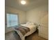 Cozy bedroom featuring a comfortable bed, carpet flooring, and a well-lit window at 1252 Allusion Ln # 201, Mount Pleasant, SC 29466
