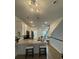 Modern kitchen with a granite countertop island and stainless steel appliances, perfect for cooking and entertaining at 1252 Allusion Ln # 201, Mount Pleasant, SC 29466