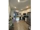 Gourmet kitchen featuring stainless steel appliances, granite counters, and seamlessly flows into the living area at 1252 Allusion Ln # 201, Mount Pleasant, SC 29466