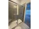 Modern tiled shower with glass doors and built-in seat offers a spa-like experience at 1252 Allusion Ln # 201, Mount Pleasant, SC 29466