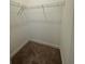 Walk-in closet with wire shelving providing storage for clothes and accessories at 1252 Allusion Ln # 201, Mount Pleasant, SC 29466