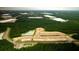A lush green forest surrounds the new community development at 127 Lilac Grove Way, Summerville, SC 29486