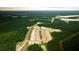 A lush green forest surrounds the new community development at 127 Lilac Grove Way, Summerville, SC 29486