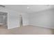 Spacious carpeted bedroom showcasing neutral tones and natural light at 127 Lilac Grove Way, Summerville, SC 29486