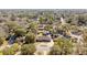 An aerial shot of the home in a peaceful neighborhood surrounded by lush trees and well-maintained properties at 1288 Old Colony Rd, Mount Pleasant, SC 29464