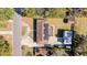 Aerial view of a home with solar panels, a large backyard, and a shed at 1288 Old Colony Rd, Mount Pleasant, SC 29464