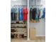 Walk-in closet featuring ample storage space with hanging racks, shelves, and hardwood flooring at 1288 Old Colony Rd, Mount Pleasant, SC 29464
