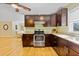 A well-equipped kitchen with stainless steel appliances, granite countertops, and plenty of storage at 1288 Old Colony Rd, Mount Pleasant, SC 29464