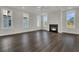 Comfortable living room with fireplace and bright windows bringing in natural light at 132 Grange Cir, Summerville, SC 29486