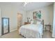 Comfortable bedroom featuring a bed, stylish mirror, and decor at 1321 Telfair Way, Charleston, SC 29412