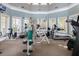 Community gym with cardio and weight equipment ready for a workout with plenty of natural light at 1321 Telfair Way, Charleston, SC 29412