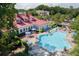 Large pool with blue lounge chairs is ready for you at this desirable community at 1321 Telfair Way, Charleston, SC 29412