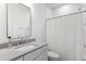Clean bathroom with a modern vanity, a large mirror, and a shower with a white shower curtain at 1328 Upper Union Rd, Mount Pleasant, SC 29464