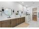 Elegant bathroom featuring a double vanity, modern fixtures, and a luxurious walk-in shower with marble tile at 1328 Upper Union Rd, Mount Pleasant, SC 29464