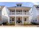 Beautiful two-story home with double porches and manicured landscaping at 1328 Upper Union Rd, Mount Pleasant, SC 29464