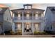 Charming two-story home with double porches and classic architectural details at 1328 Upper Union Rd, Mount Pleasant, SC 29464