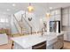 Modern kitchen with a large island, farmhouse sink, and stainless steel appliances at 1328 Upper Union Rd, Mount Pleasant, SC 29464