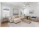 Bright and airy living room featuring modern furniture, neutral tones, and ample natural light at 1328 Upper Union Rd, Mount Pleasant, SC 29464