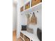 Functional mudroom with built-in storage, hooks, seating, and a stylish design perfect for organization at 1328 Upper Union Rd, Mount Pleasant, SC 29464