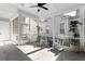 Charming screened-in porch featuring rocking chairs and a view of the backyard at 1328 Upper Union Rd, Mount Pleasant, SC 29464
