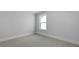 Cozy bedroom featuring natural light, fresh paint, and new carpet at 134 Lilac Grove Way, Summerville, SC 29486