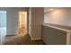 Hallway with carpet leads to bathroom and bedrooms; shows open floorplan of the house at 134 Lilac Grove Way, Summerville, SC 29486