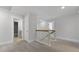 Upstairs hallway featuring fresh paint, modern trim, and new carpet throughout at 134 Lilac Grove Way, Summerville, SC 29486