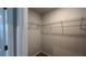 An empty walk-in closet with wire shelving for storage at 134 Lilac Grove Way, Summerville, SC 29486