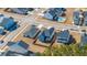 This aerial showcases neighborhood layout with backyard pools and well-maintained properties in a vibrant community at 143 Oyster Tide Ave, Summerville, SC 29485
