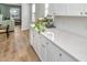 Clean, white kitchen countertop with ample space for food preparation and storage at 143 Oyster Tide Ave, Summerville, SC 29485
