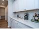 Bright kitchen counter featuring a beverage station with coffee maker and wine storage at 143 Oyster Tide Ave, Summerville, SC 29485