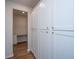 Hallway featuring white cabinets and a built-in desk area, perfect for a home office setup at 143 Oyster Tide Ave, Summerville, SC 29485