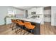 Modern kitchen with a large island, stainless steel appliances, and stylish counter stools at 143 Oyster Tide Ave, Summerville, SC 29485