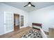 Bright office space with French doors, wood floors, and a stylish console table at 143 Oyster Tide Ave, Summerville, SC 29485
