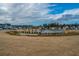 The pond is a community focal point, enhancing neighborhood appeal and providing a serene backdrop for residents to enjoy at 143 Oyster Tide Ave, Summerville, SC 29485