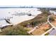 Picturesque waterfront community featuring a fishing pier, sandy beach, playground, and boat docks at 145 Pier View St # 316, Charleston, SC 29492