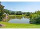 Pond at edge of property with apartment building in background at 145 Pier View St # 316, Charleston, SC 29492