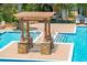Community pool with seating and steps to enter pool at 145 Pier View St # 316, Charleston, SC 29492