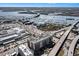 Attractive aerial view of a waterway and buildings featuring a marina, bridges, and detailed architecture at 150 Bee St # 714, Charleston, SC 29401