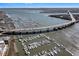 Overhead view of marina with many boats docked and bridges along the coastline at 150 Bee St # 714, Charleston, SC 29401