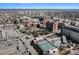 Remarkable aerial view of a cityscape featuring numerous buildings, greenery, and outdoor tennis courts at 150 Bee St # 714, Charleston, SC 29401