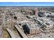 Expansive aerial view of a bustling city featuring modern architecture, bridges, and waterfront views at 150 Bee St # 714, Charleston, SC 29401