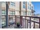 Charming balcony with city views, patio furniture, and decorative lights for relaxing outdoor moments at 150 Bee St # 714, Charleston, SC 29401